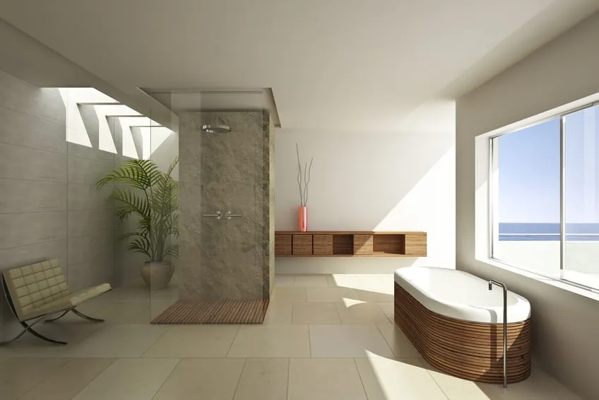 Badezimmer mit offener Dusche, Badewanne mit Holzverkleidung und verlegtem Fliesendboden